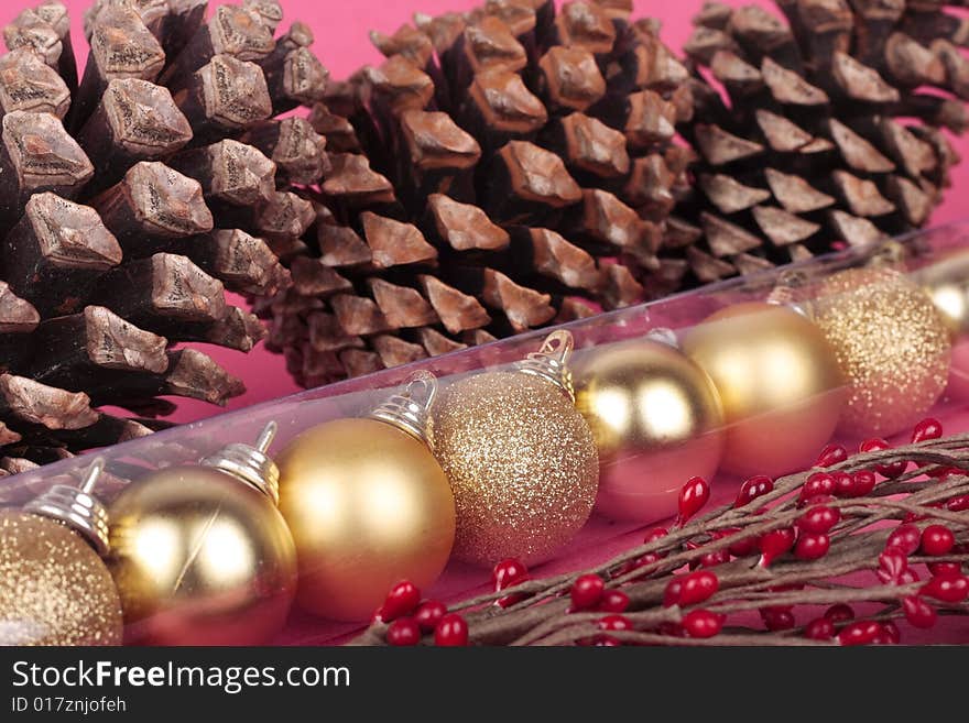 Decorative Xmas pine cones and gold balls. Decorative Xmas pine cones and gold balls