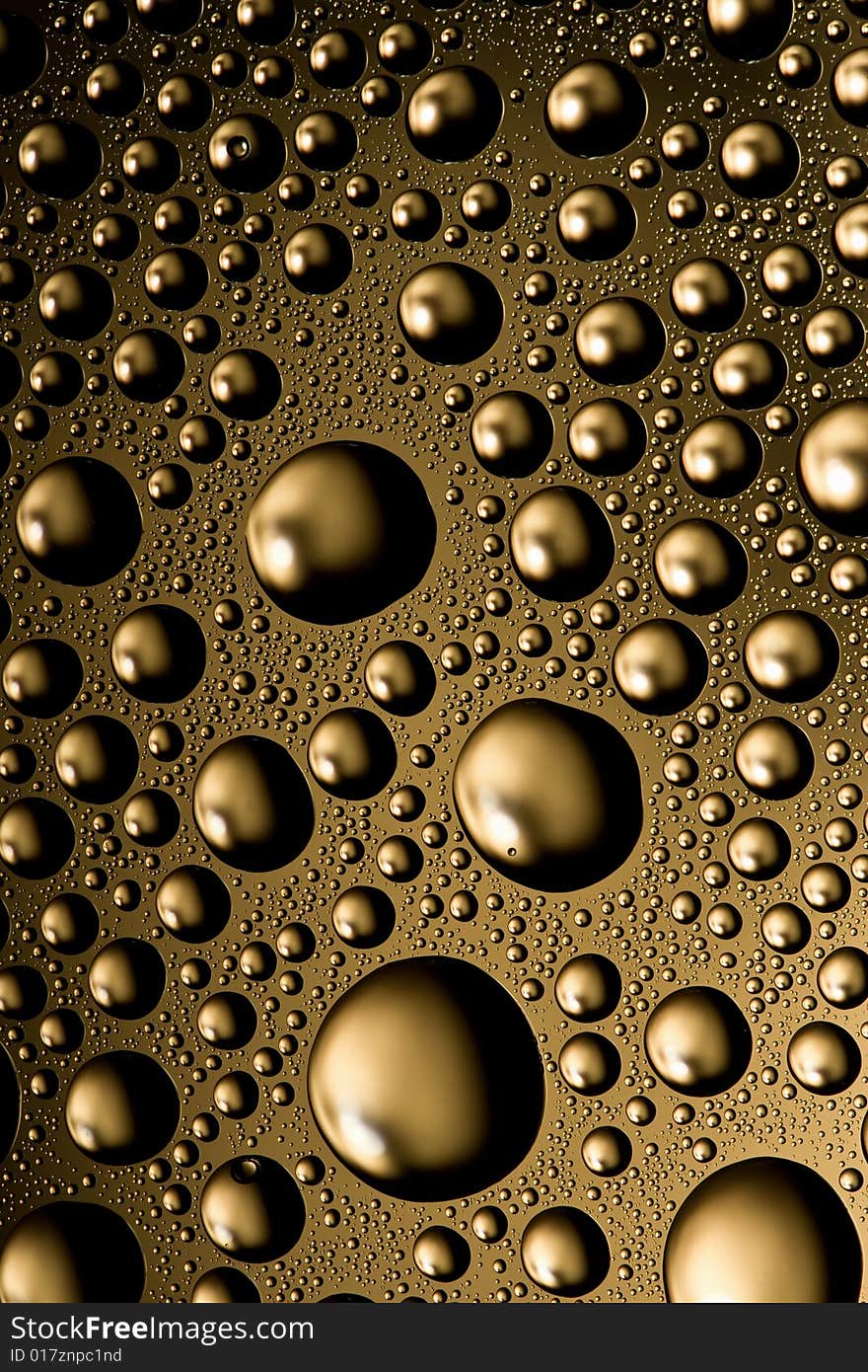 Golden water drops background