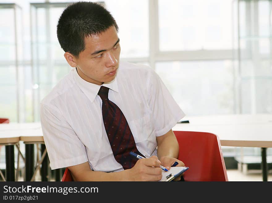 Young asian working in office