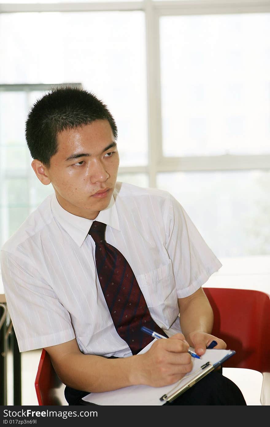 Young asian working in office