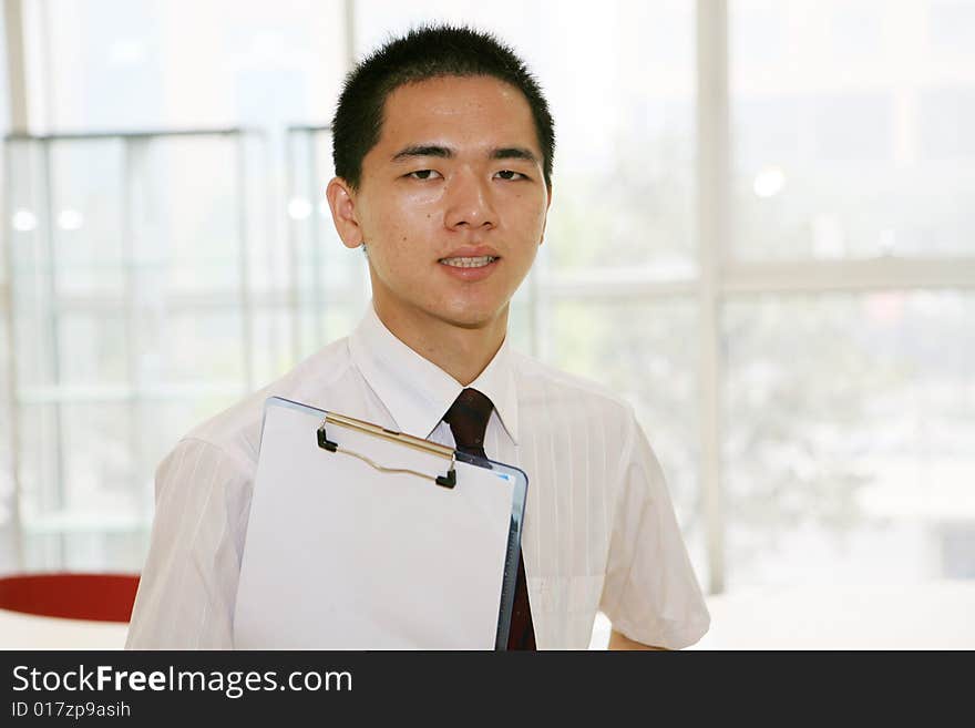 Young asian working in office