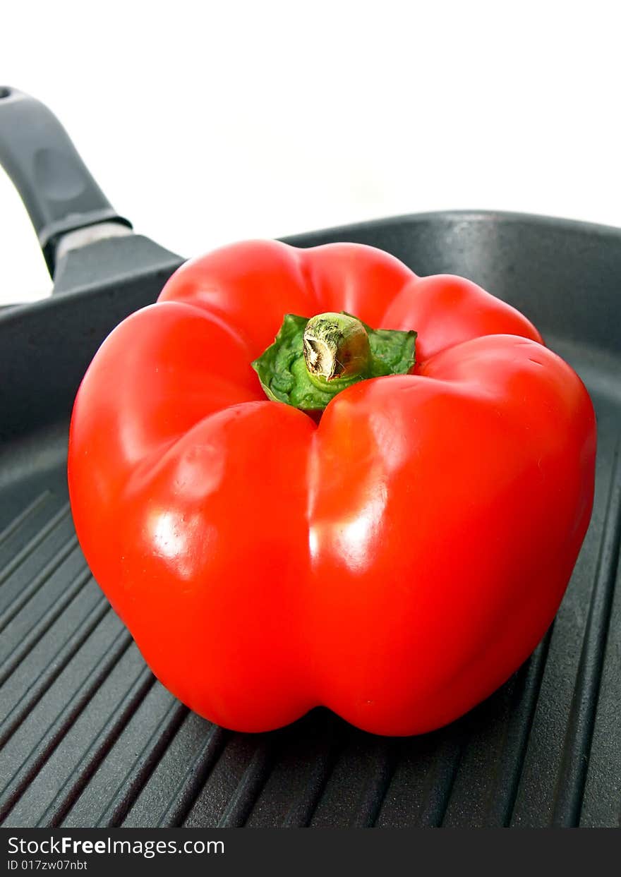 Close up of the red paprica in the frying pan. Close up of the red paprica in the frying pan.