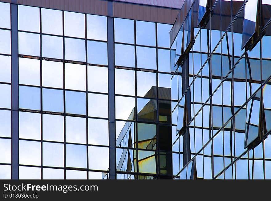 Glass wall of business center, may be used as background