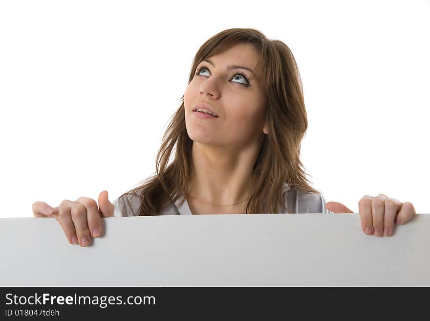 Close-up. Beautiful woman holding a billboard. Isolated on white