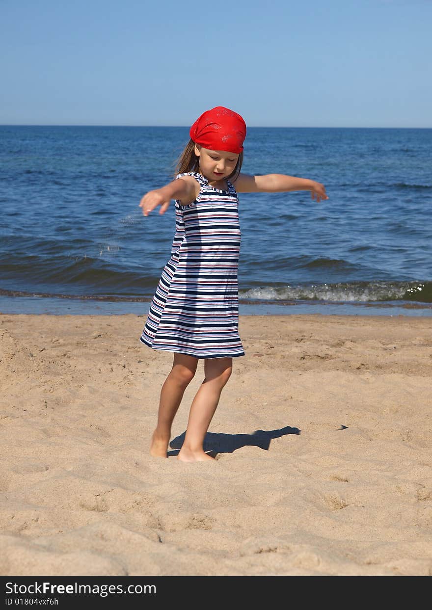 Young girl is dancing on the beach. Young girl is dancing on the beach