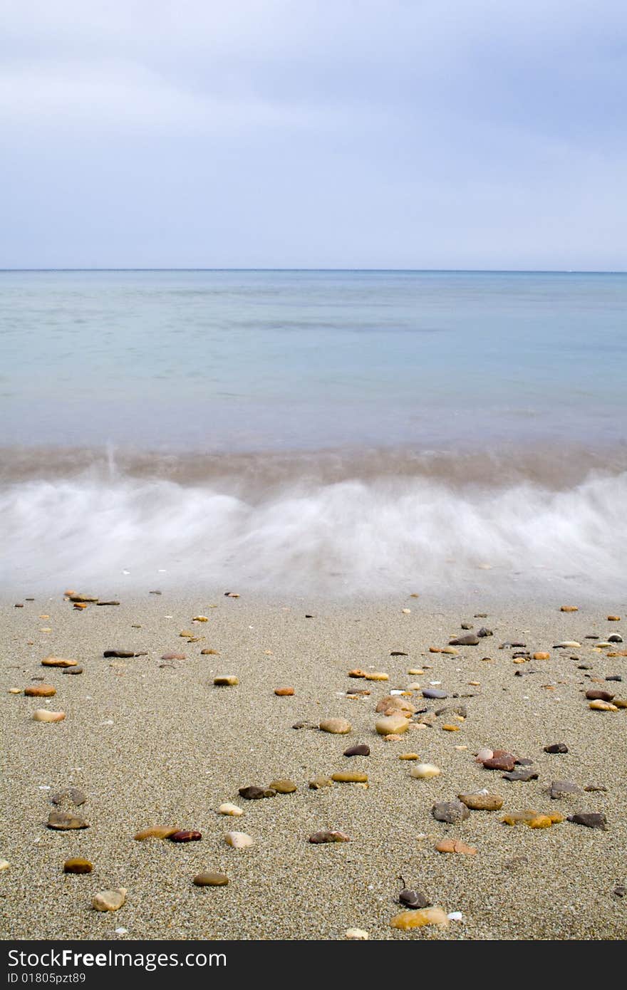 Waves breaking in the sand of Ibiza. Waves breaking in the sand of Ibiza