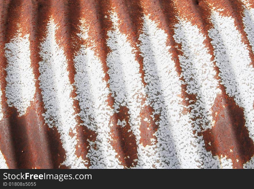 A drainage pipe makes a colorful yet strong background.