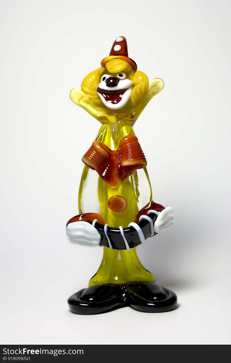 Humorous glass clown on a white background. Humorous glass clown on a white background