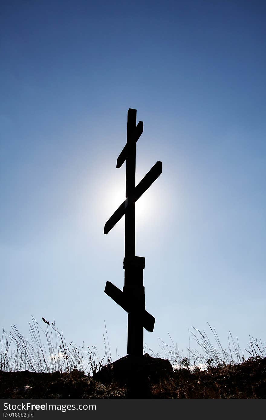 Eight-pointed [Russian] cross in mountains. Eight-pointed [Russian] cross in mountains