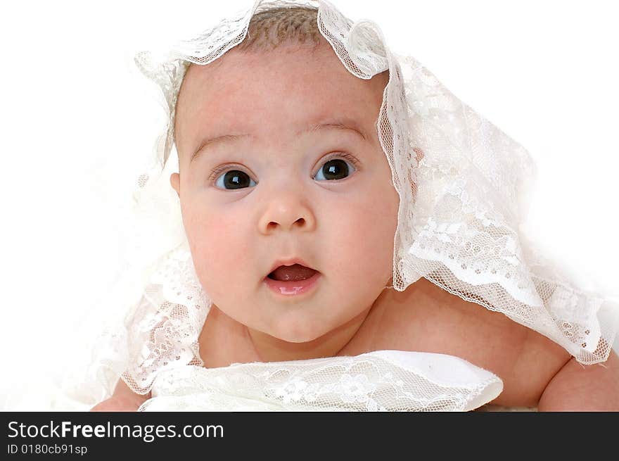 Close-up portrait. Little baby isolated on white background. Close-up portrait. Little baby isolated on white background