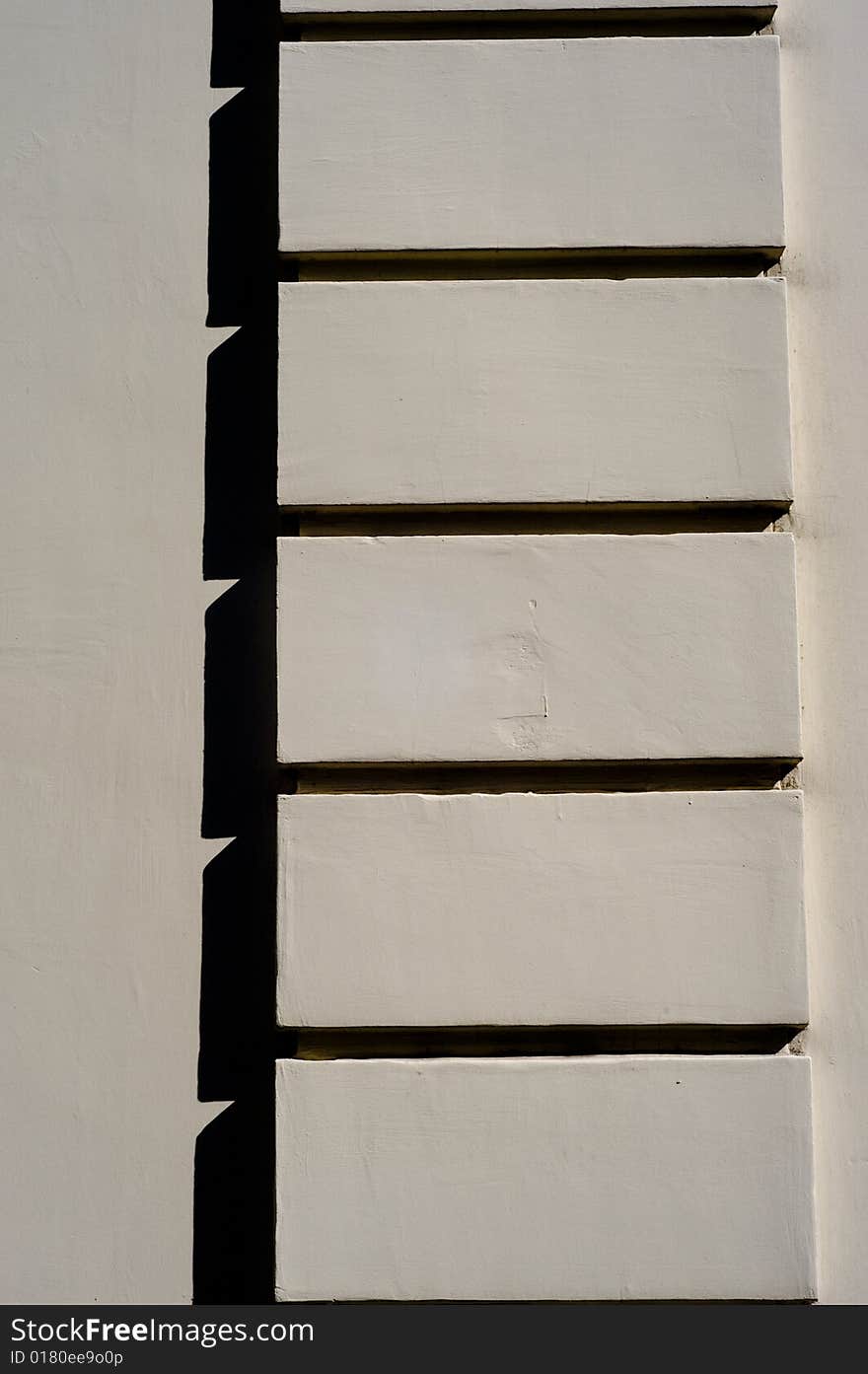 White wall detail with shadow