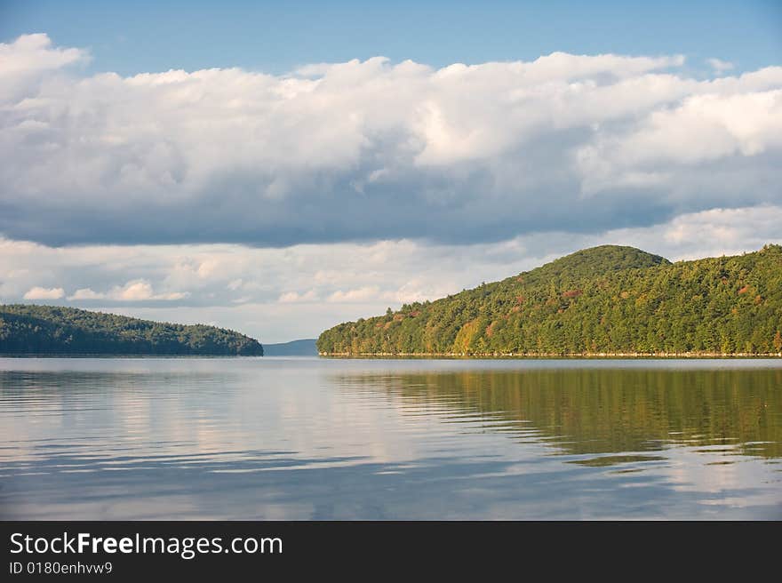 Clouds are reflected in lake water