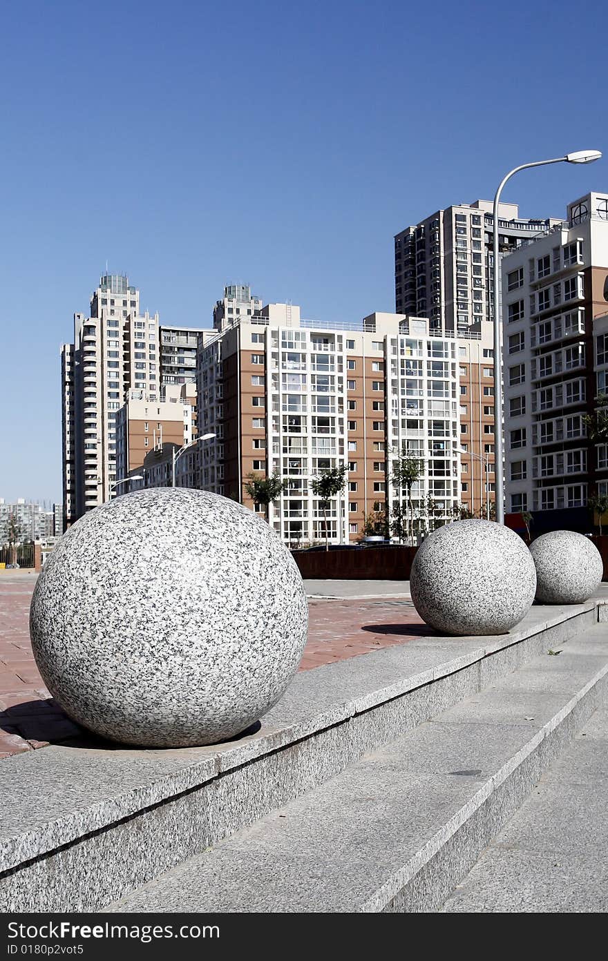 Stone balls on the ground in a residential area of Beijing, China. Stone balls on the ground in a residential area of Beijing, China.