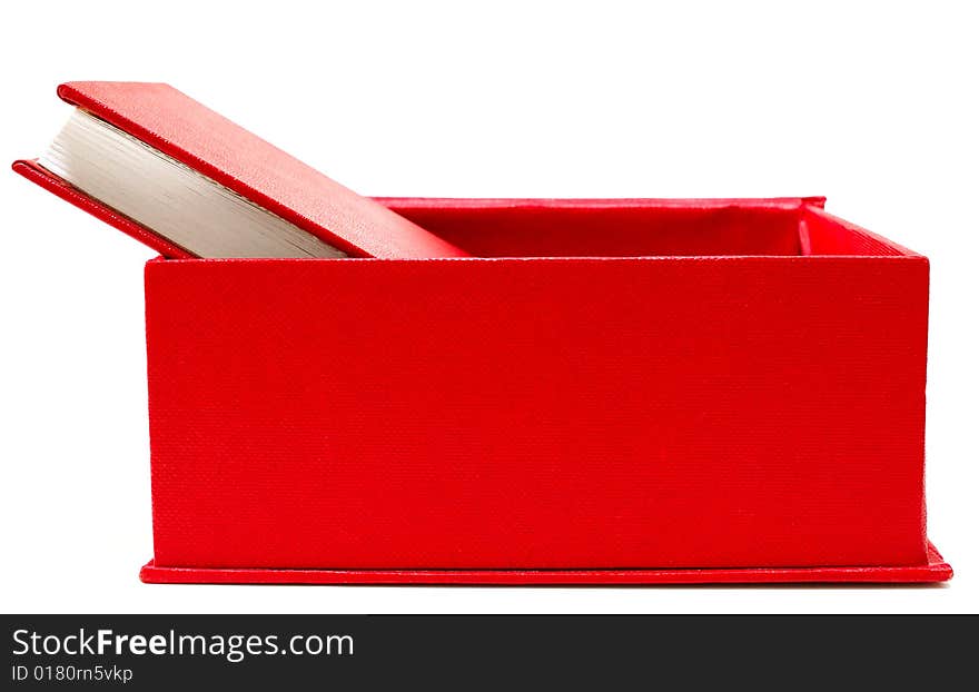 Red cover book in red cardboard box on isolated background. Red cover book in red cardboard box on isolated background.