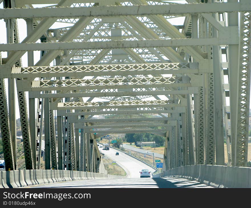 Crossing a bridge with support beams showing.