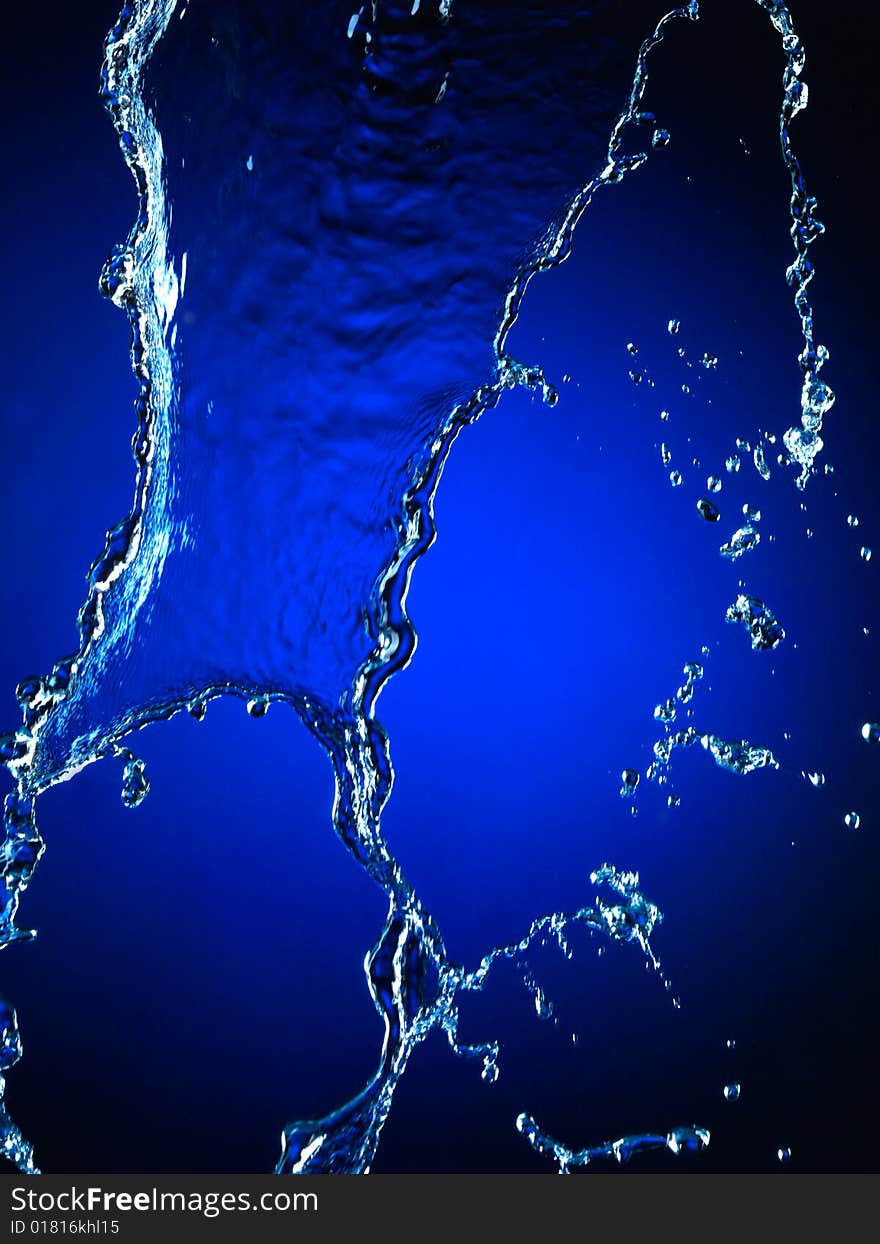 Falling water on blue. Very high resolution. Falling water on blue. Very high resolution.