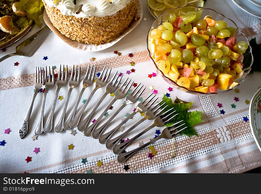 Forks laying on birthday table, organized in nice setting. Forks laying on birthday table, organized in nice setting