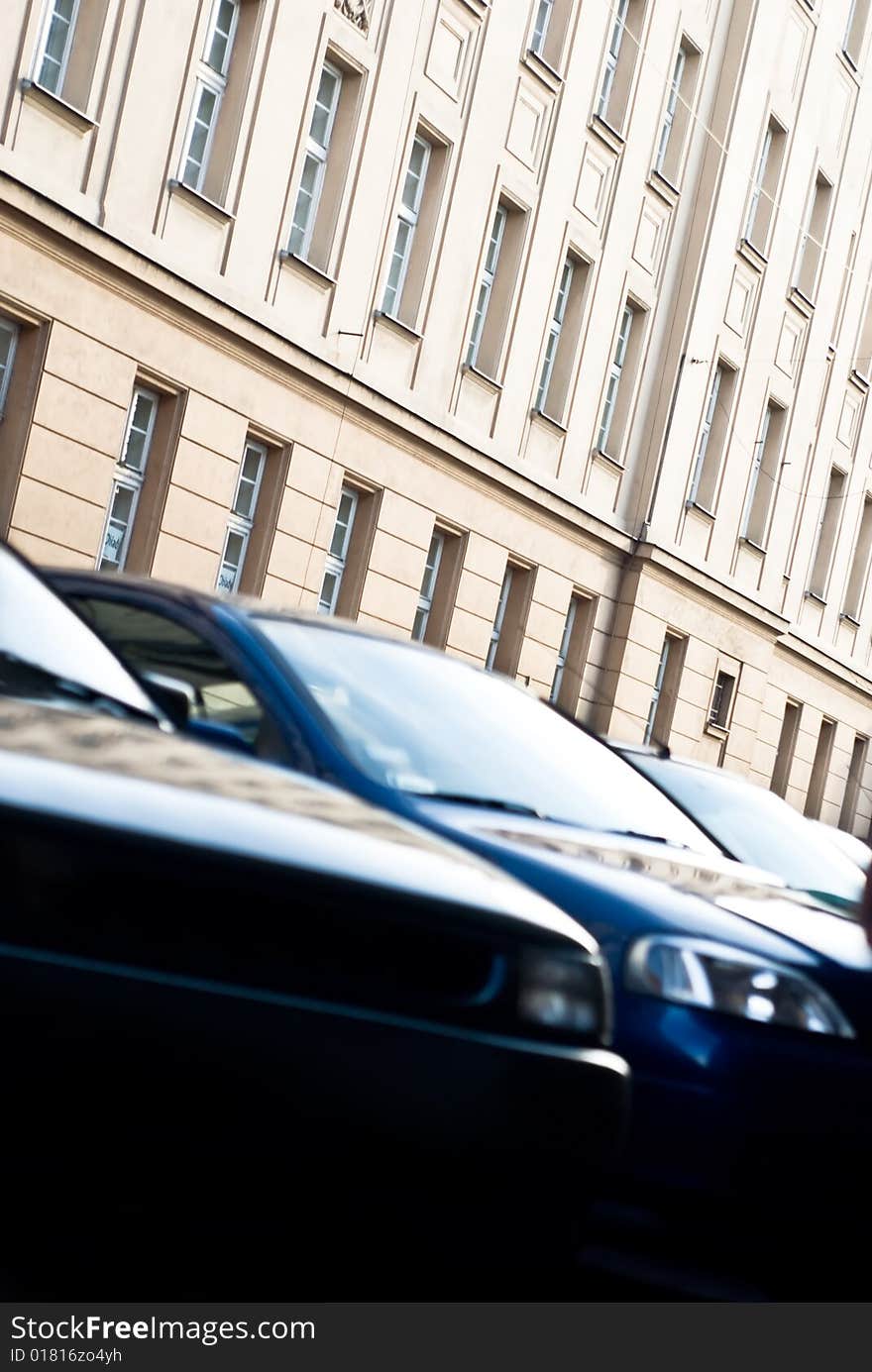 Cars over high building