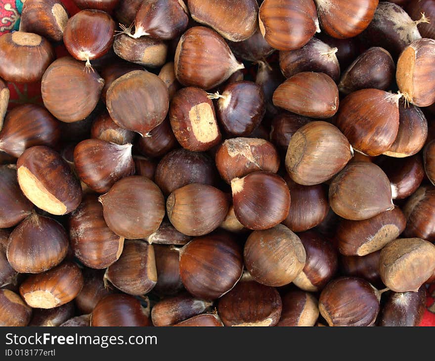 Chestnuts brown background of northern Italy. Chestnuts brown background of northern Italy