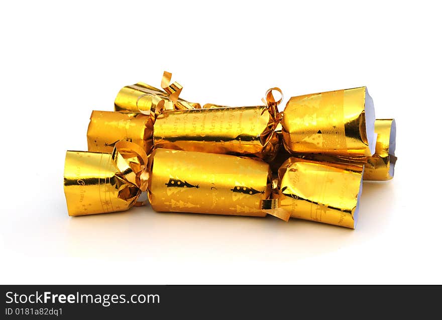 Shot of some gold coloured christmas crackers