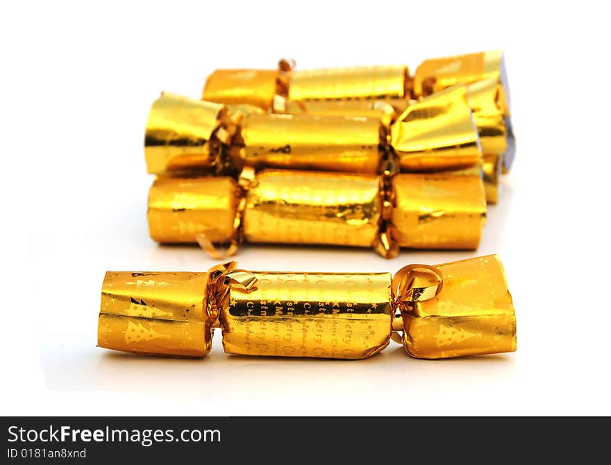 Shot of some gold coloured christmas crackers