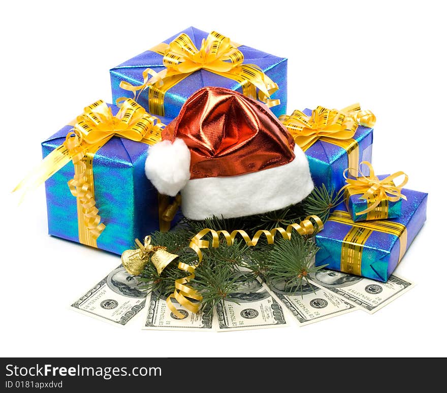 Santa's red hat, gift boxes and money on a white background