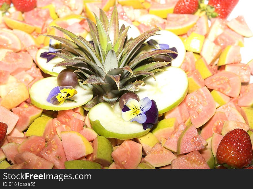 Fruit Salad display with guava, apple and strawberries