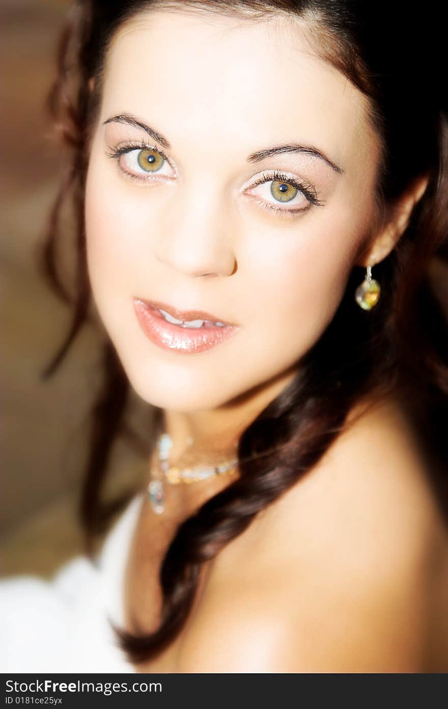 Beautiful brunette bride with green eyes, close up. Beautiful brunette bride with green eyes, close up