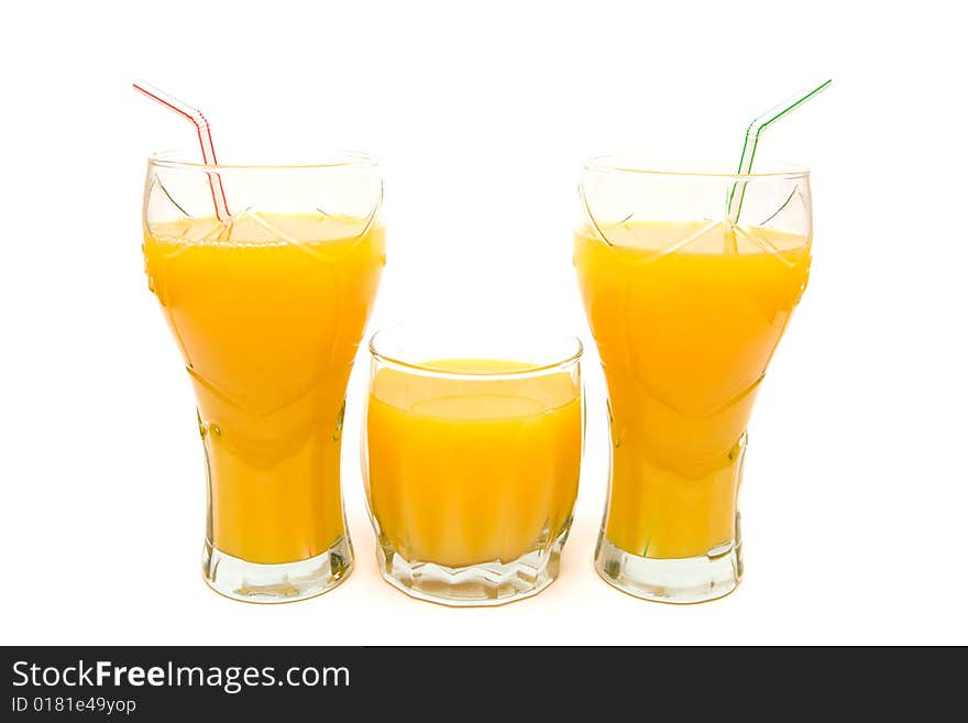 three glasses of orange juice