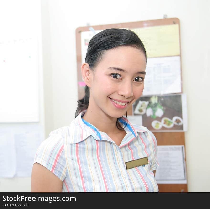 Photograph of staff smiling at work