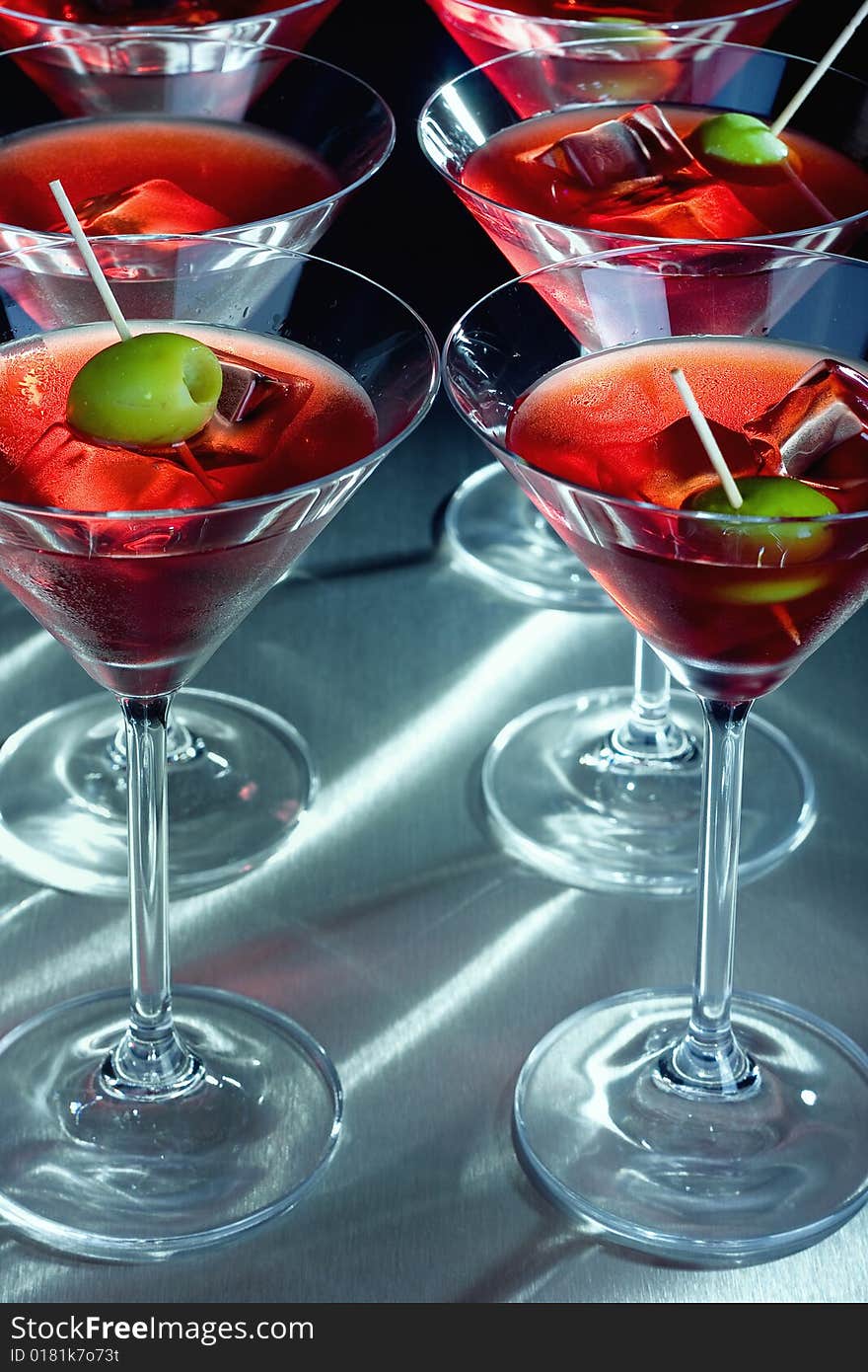 Martini Glasses With Olive And Ice Cube