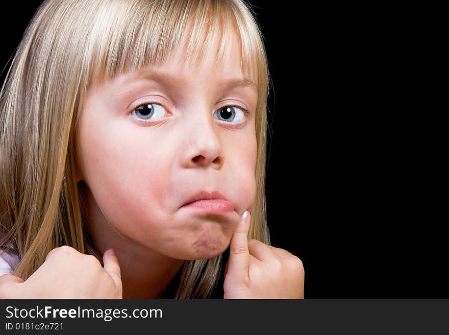 Blond Girl with big blue eyes on a black background