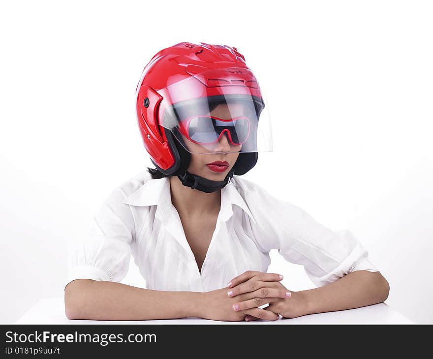 A sexy asian biker girl with a red helmet. A sexy asian biker girl with a red helmet