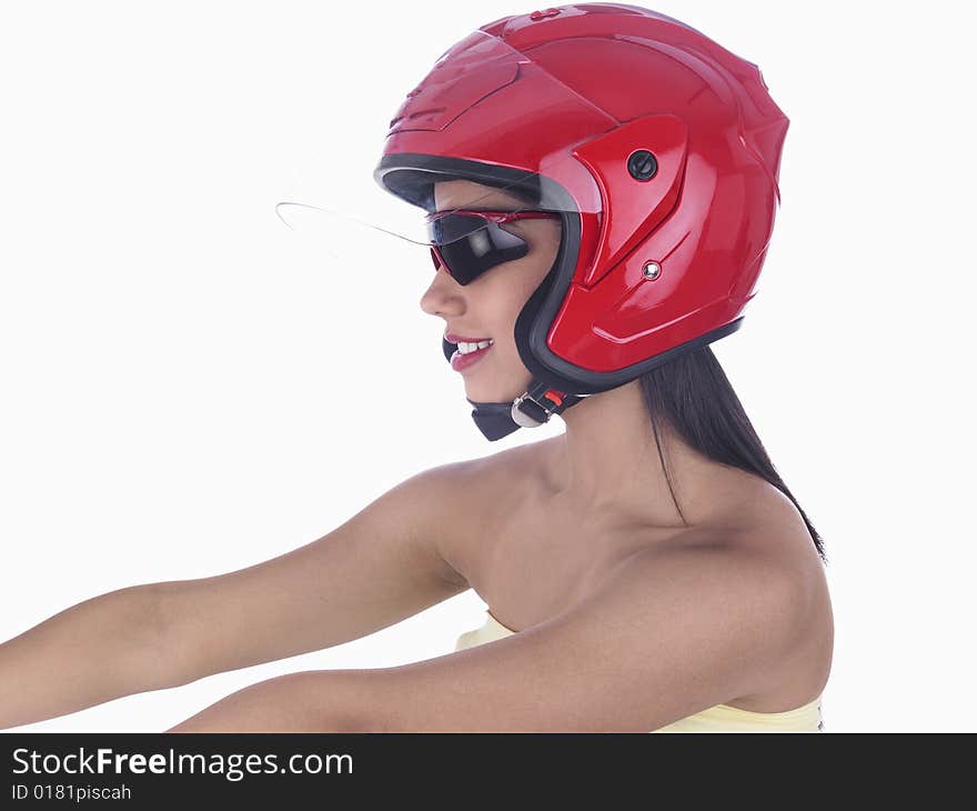 A sexy female with red helmet riding her bike