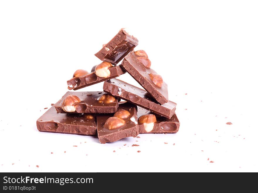 Chocolate tower with crumb isolated on white