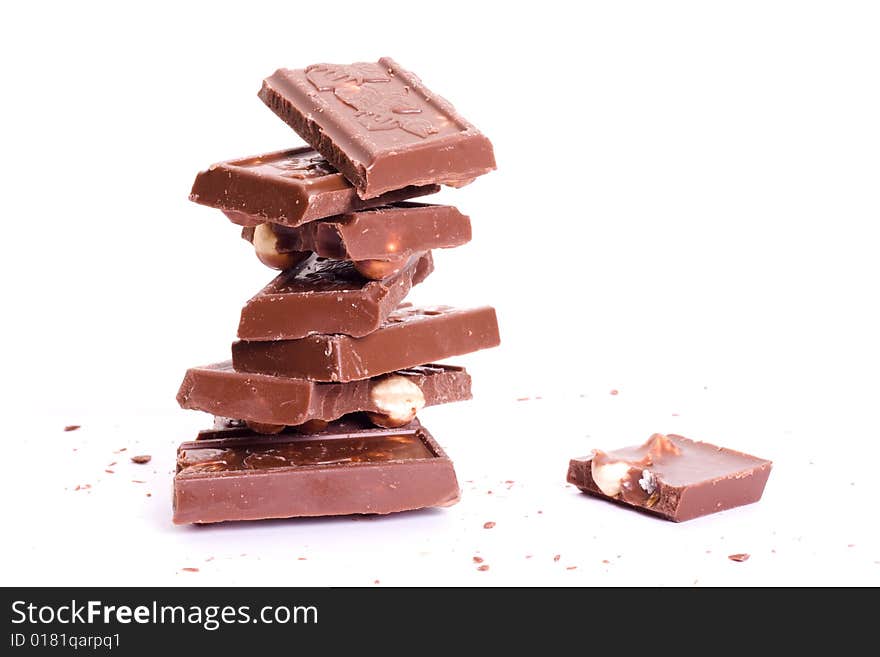 Chocolate tower with crumb isolated on white