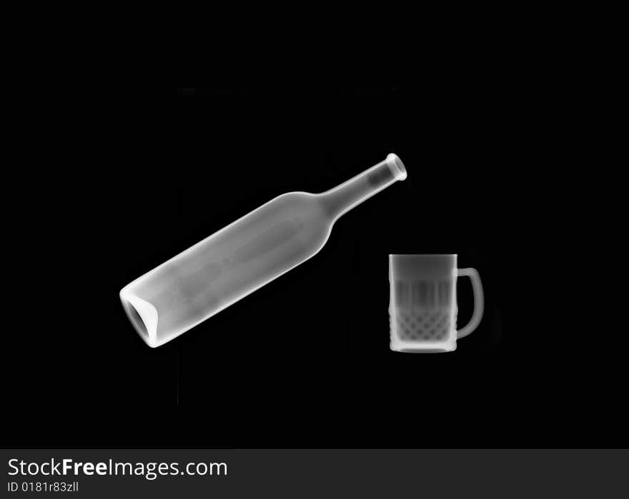 X-ray picture:bottle and mug on black background