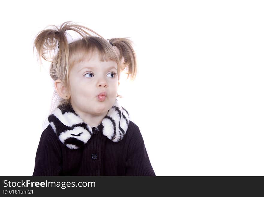 A little blond girl making silly faces. A little blond girl making silly faces