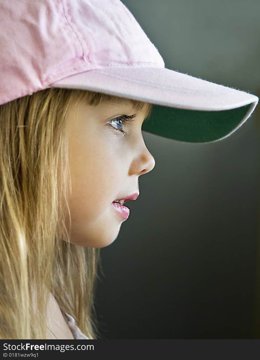 Portrait of a beautiful little girl, side view. Portrait of a beautiful little girl, side view