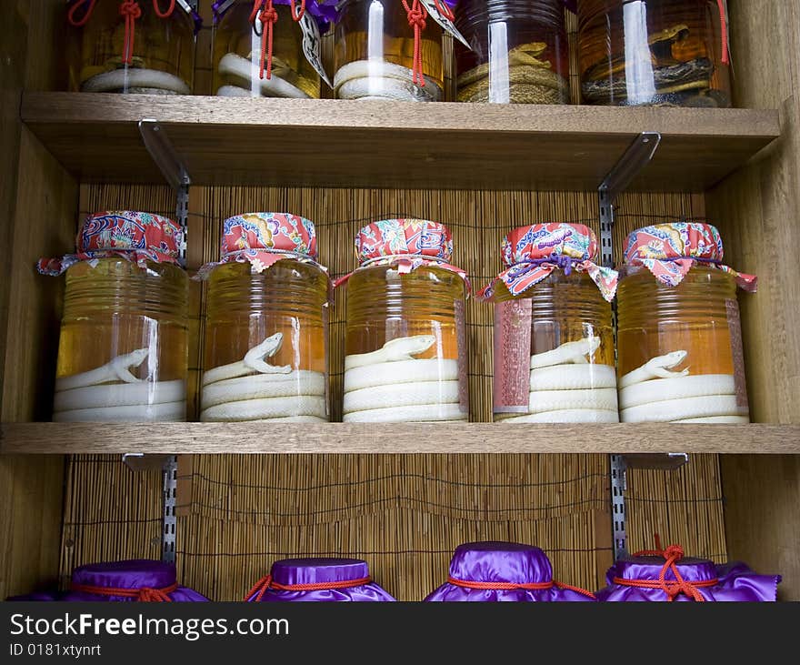 Awamori bottles with snake inside