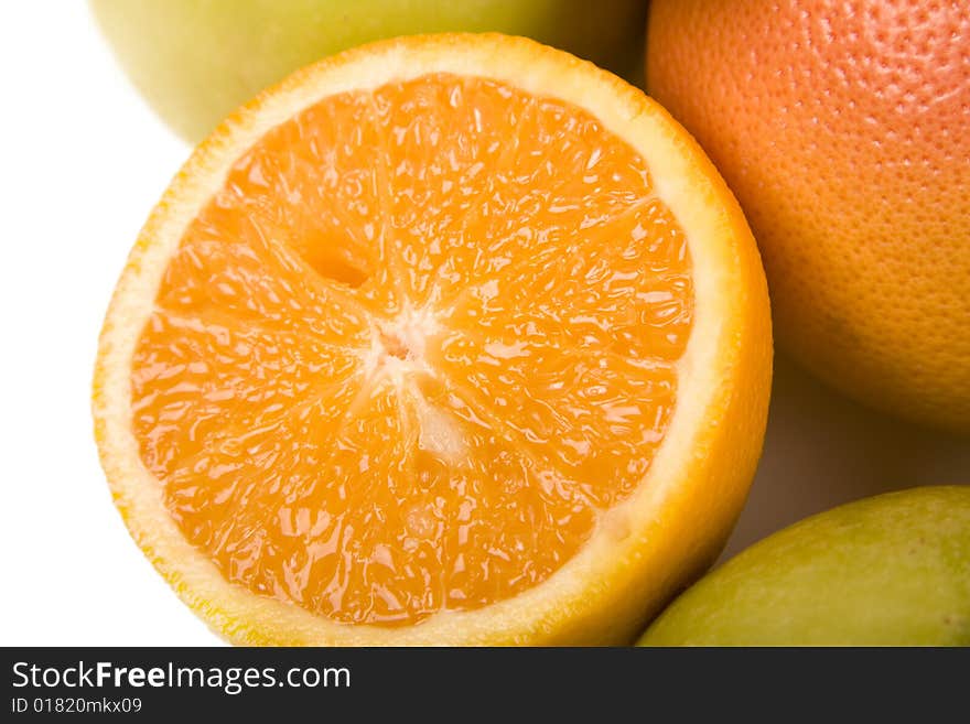 A few of citrus fruits with the orange on the front