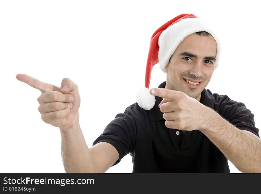 Pointing man with christmas hat