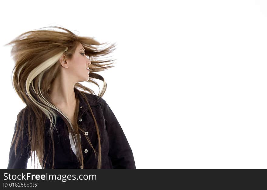 Blond girl with fluttered hair against white background. Blond girl with fluttered hair against white background