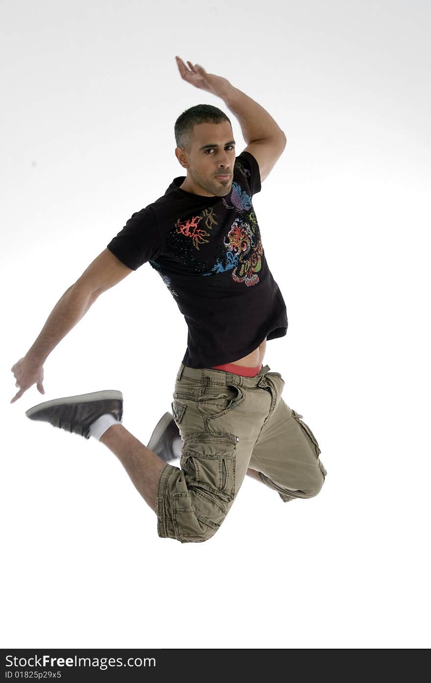 Young jumping male on an isolated white background