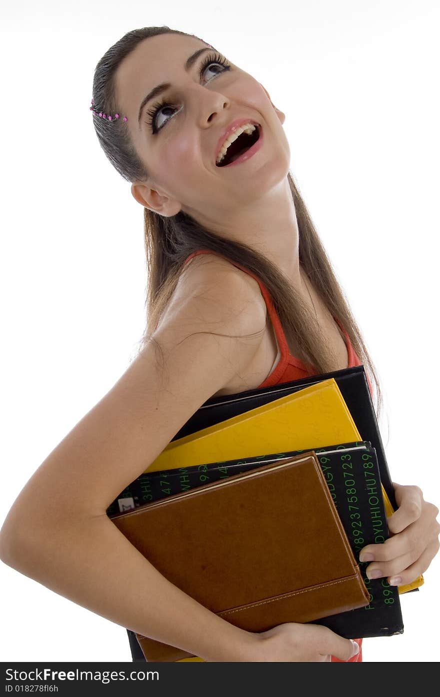 School girl looking upward on an isolated white background