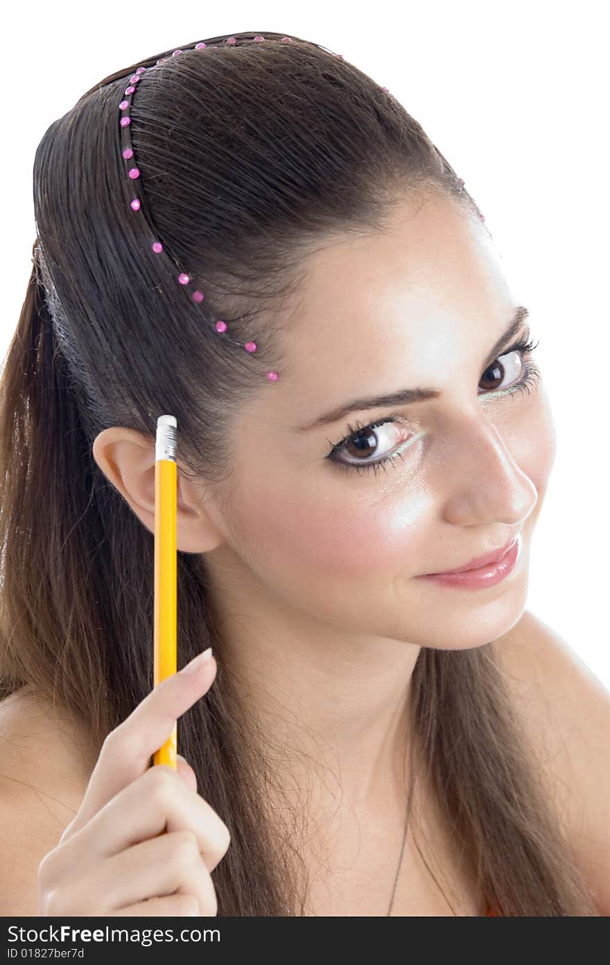 Brunette girl with pencil on an isolated white background