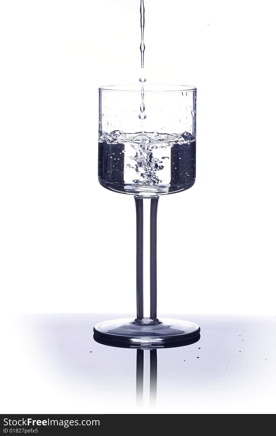 Isolated glass of water in white background