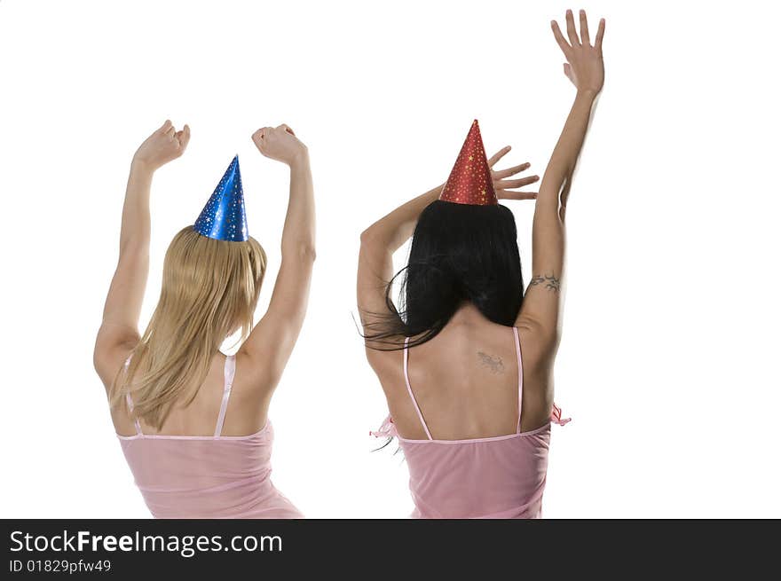 Two girls with upraised hands. Two girls with upraised hands