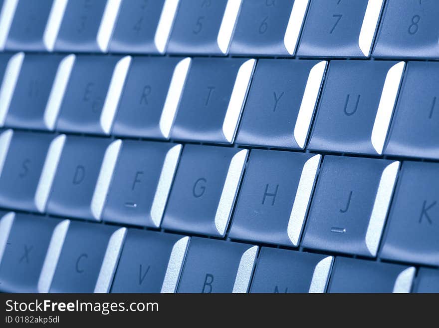 Close-up of notebook's keyboard, details of technology