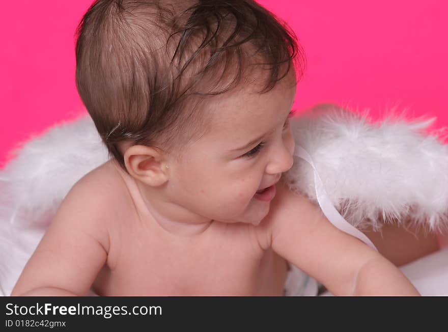 Cute baby girl withangel wings on pink background. Cute baby girl withangel wings on pink background